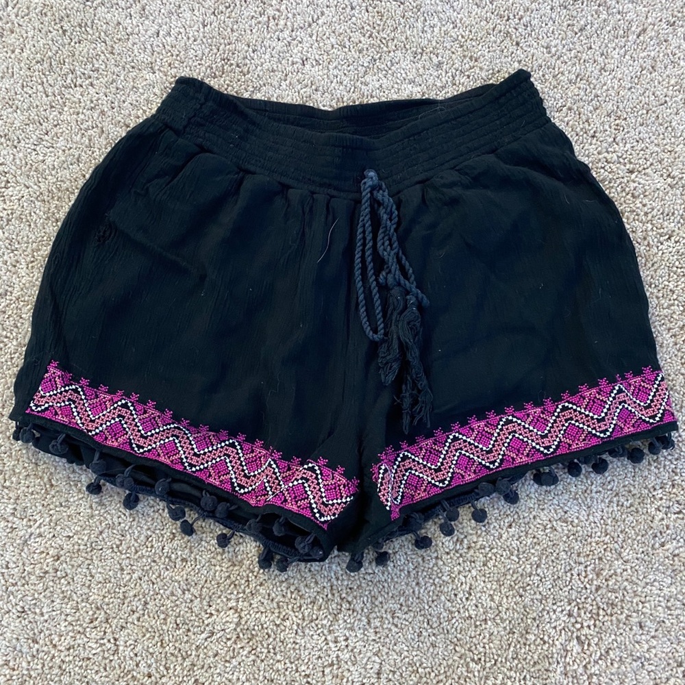 black frilly shorts